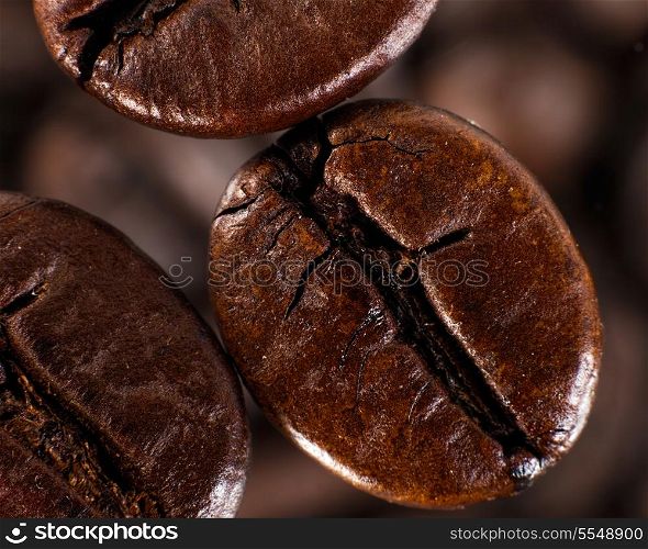 Cofee beans against blurred abstracr backgrounds