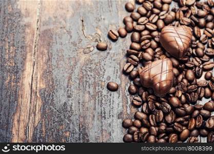Coffee and chocolate on grunge wooden background - Valentine&rsquo;s day and love concept