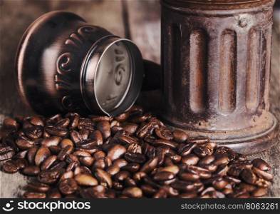 Coffee and grinder on wooden table stylized old photo. Coffee and grinder on wooden table