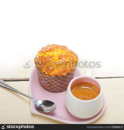 coffee and muffin served on a pink heart shaped dish