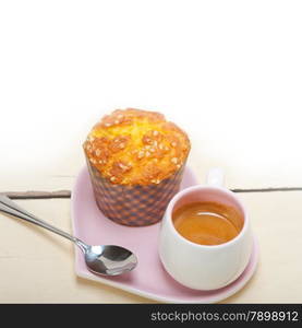 coffee and muffin served on a pink heart shaped dish