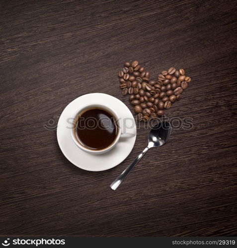 coffee attributes on a wooden background. Top view of coffee attributes on a wooden background