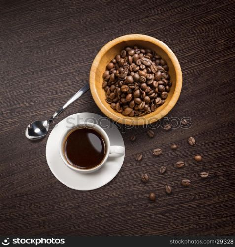 coffee attributes on a wooden background. Top view of coffee attributes on a wooden background