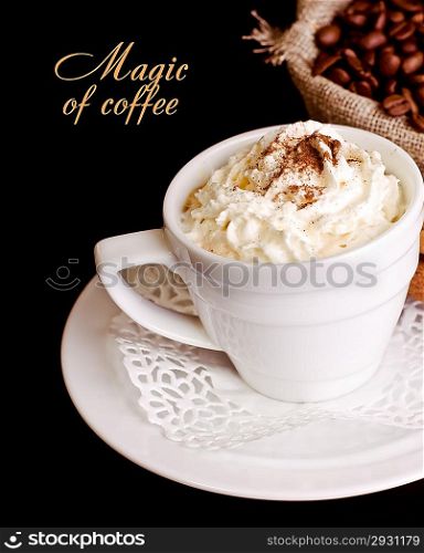 Coffee background and white cup isolated in black