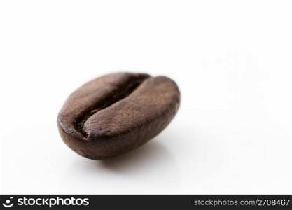 Coffee bean macro. closeup of one coffee bean on white background
