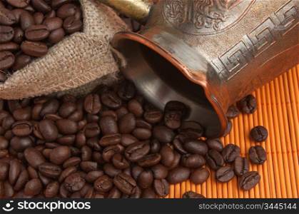 coffee beans and copper coffee maker