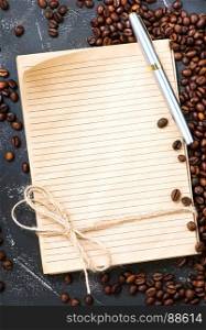 coffee beans and note on a table