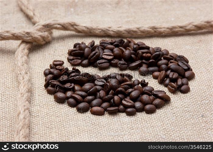 coffee beans and rope knot on sack