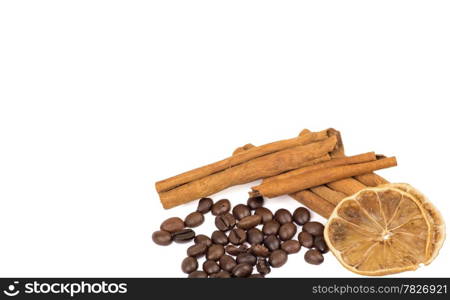 coffee beans, cinnamon and lemon isolated on white