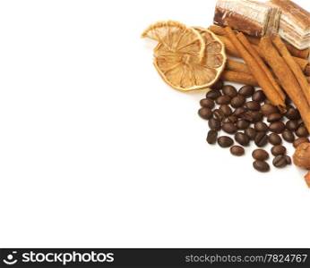 Coffee beans, cinnamon, lemon and sweets over white with a space for Your text