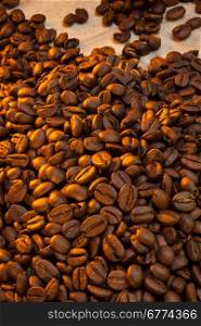 Coffee Beans - Coffee is a brewed beverage prepared from the roasted seeds of several species of an evergreen shrub of the genus Coffea.