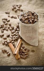 coffee beans in bag with cinnamon