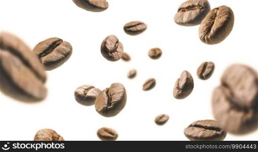 Coffee beans levitate on a white background.. Coffee beans levitate on a white background