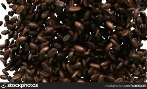 Coffee beans mixing and tossing up with slow motion