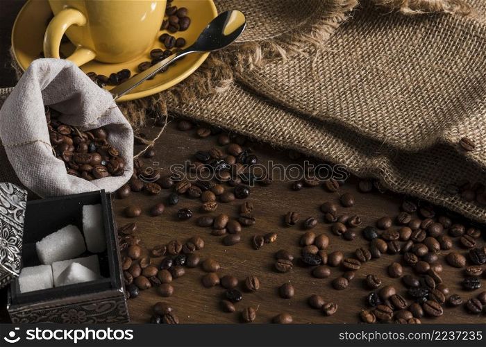 coffee beans near sack tea set box sugar sackcloth