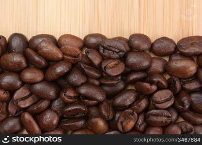 coffee beans on a wooden background