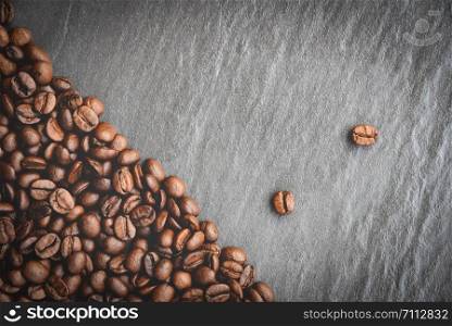 Coffee beans on dark background top view with place for text copy space