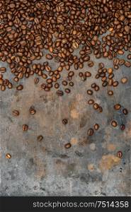 Coffee beans on grunge background. Close up. Texture