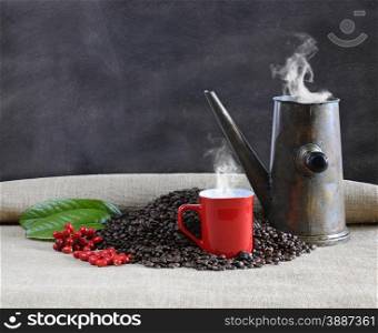 Coffee beans with blackboard on a table.