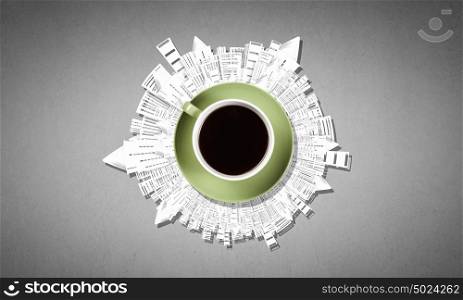 Coffee break. Conceptual image of cup of coffee and modern city concept