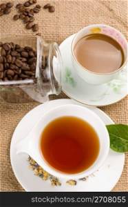 coffee, coffee beans and tea with green leaf