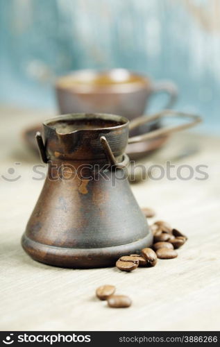 Coffee composition on blue rustic background