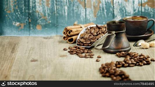 Coffee composition on blue rustic background