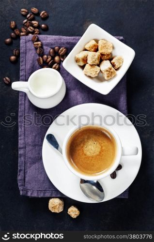 Coffee composition on dark rustic background
