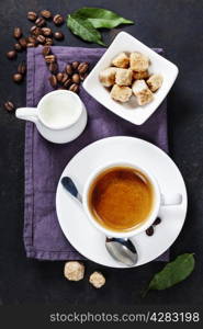 Coffee composition on dark rustic background