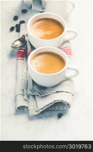 Coffee composition on white marble background