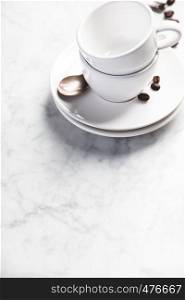 Coffee composition on white marble background, space for text. Coffee composition on white marble background, copyspace