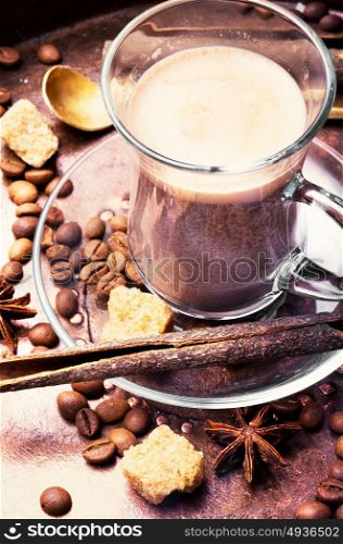 Coffee cup and beans on old copper background. Coffee and roasted coffee beans