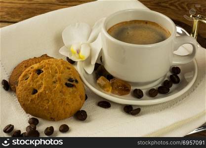Coffee cup and cookies on the serving tray. Cup of coffee. Morning coffee. Coffee cup and cookies on the serving tray