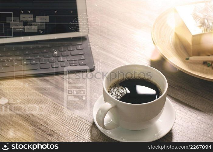 Coffee cup and Digital table dock smart keyboard,gold gift box and round wood tray,color pencil on wooden table,filter effect,icons screen
