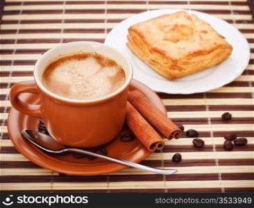 coffee cup and pie on bamboo napkin