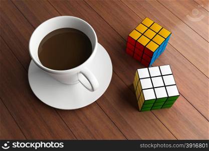 Coffee cup and Rubik cube on wooden