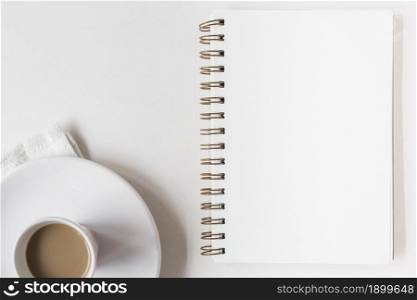 coffee cup blank spiral notepad white background. Resolution and high quality beautiful photo. coffee cup blank spiral notepad white background. High quality beautiful photo concept