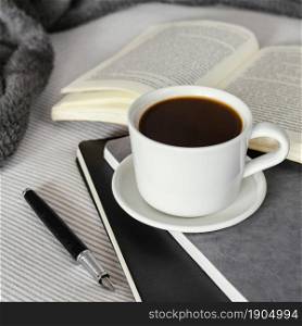 coffee cup book high angle. Beautiful photo. coffee cup book high angle