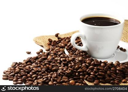 coffee cup coffee beans and jute. a coffee cup filled with coffee and beans with jute on white background