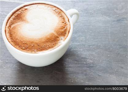 Coffee cup on grey background, stock photo