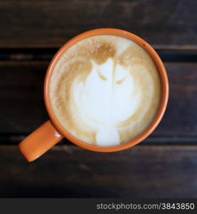 coffee cup on wooden background