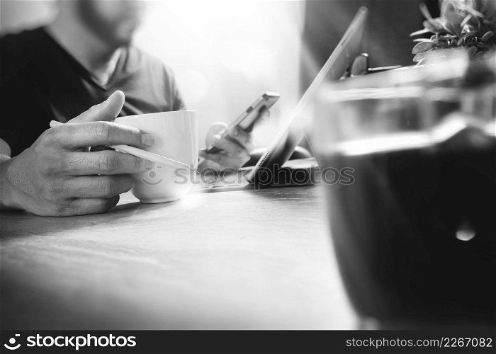 Coffee cup or tea ,glass vase dry flower herbs, on wooden table,filter effect,close up,black white  