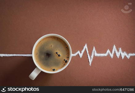 Coffee cup top view and heart beats cardiogram from sugar. Coffee cup top view and heart beats cardiogram
