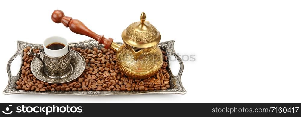 Coffee cup, tray with arabic decoration and coffeepot isolated on a white background. Free space for text. Wide photo .