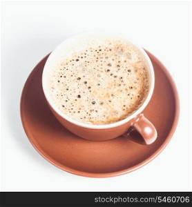 Coffee cup with crema on a white background