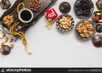 coffee cup with different nuts beads. High resolution photo. coffee cup with different nuts beads. High quality photo