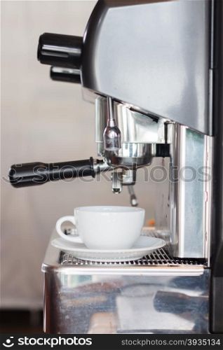 Coffee cup with espresso machine, stock photo