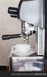 Coffee cup with espresso machine, stock photo