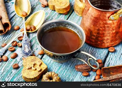 Coffee cup with sweets. Cup of Turkish coffee and luxury sweets