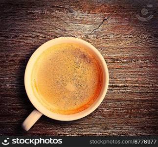Coffee cup with wood background